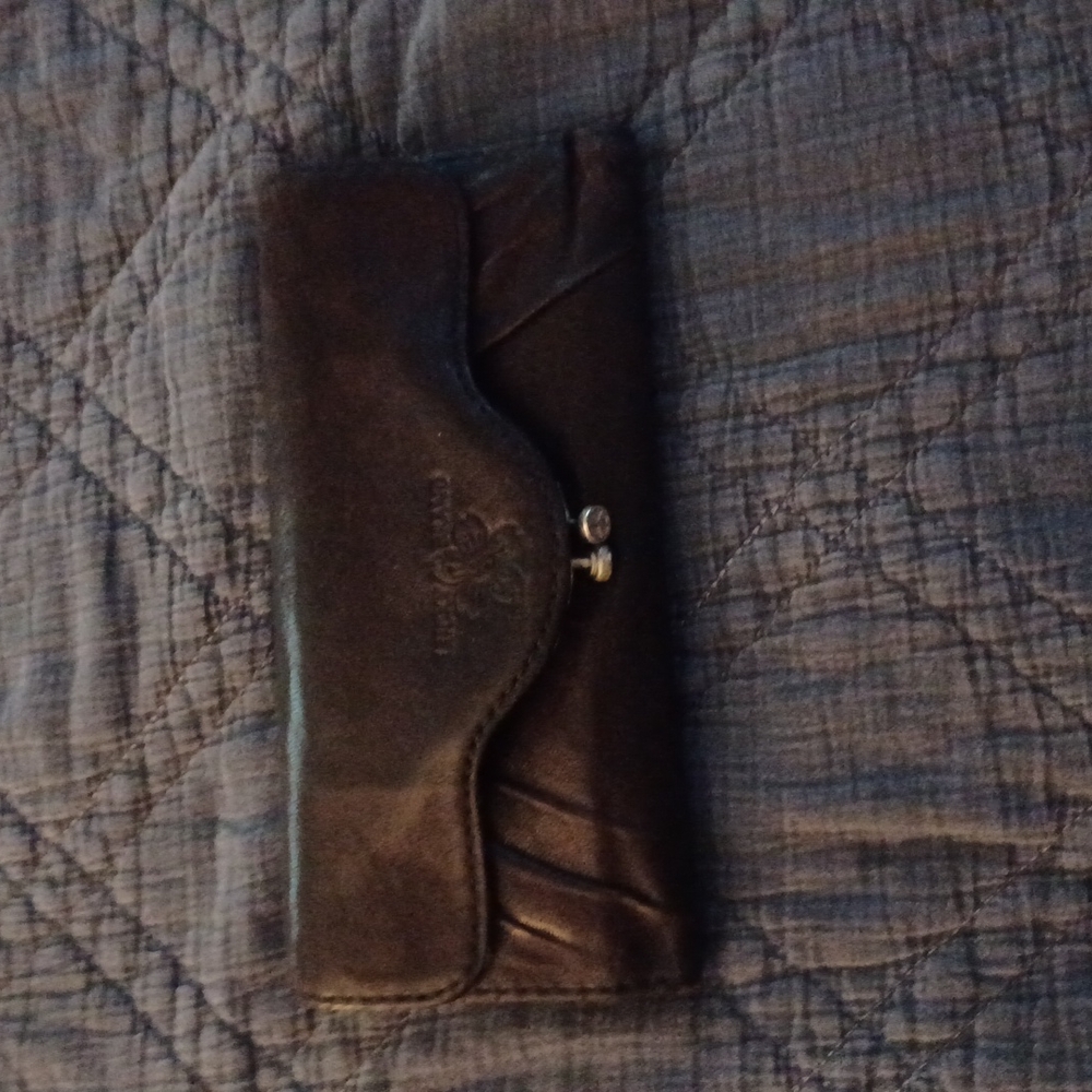 Authentic dark purple Lucky Brand wallet.